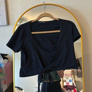 This is a black brandy Melville tie top